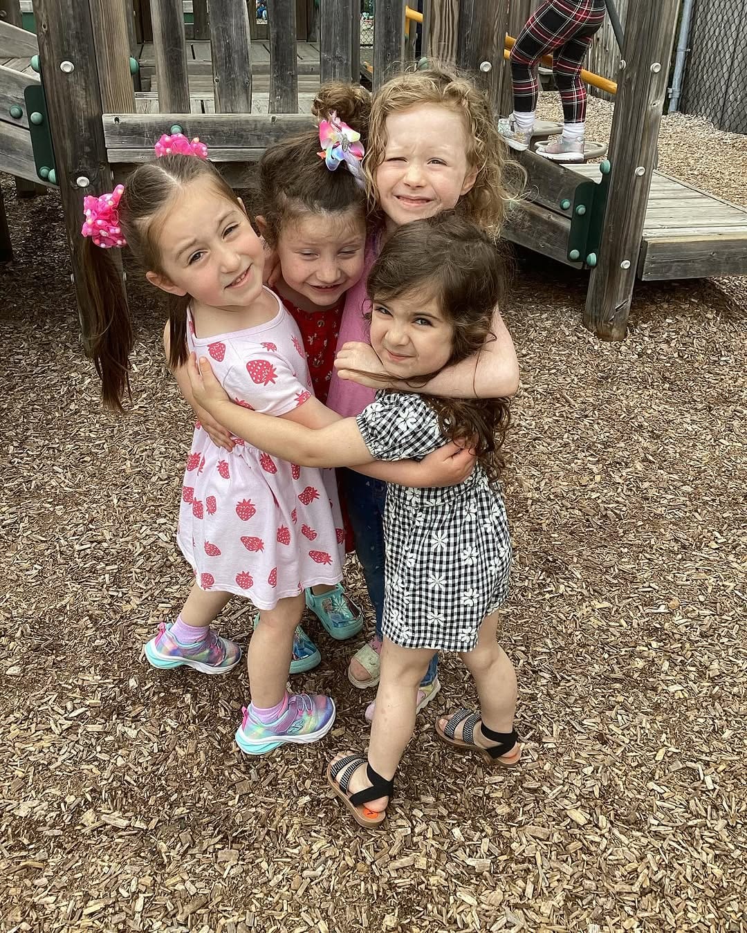 Toddlers playing on the playground at Mountainside Children's Center